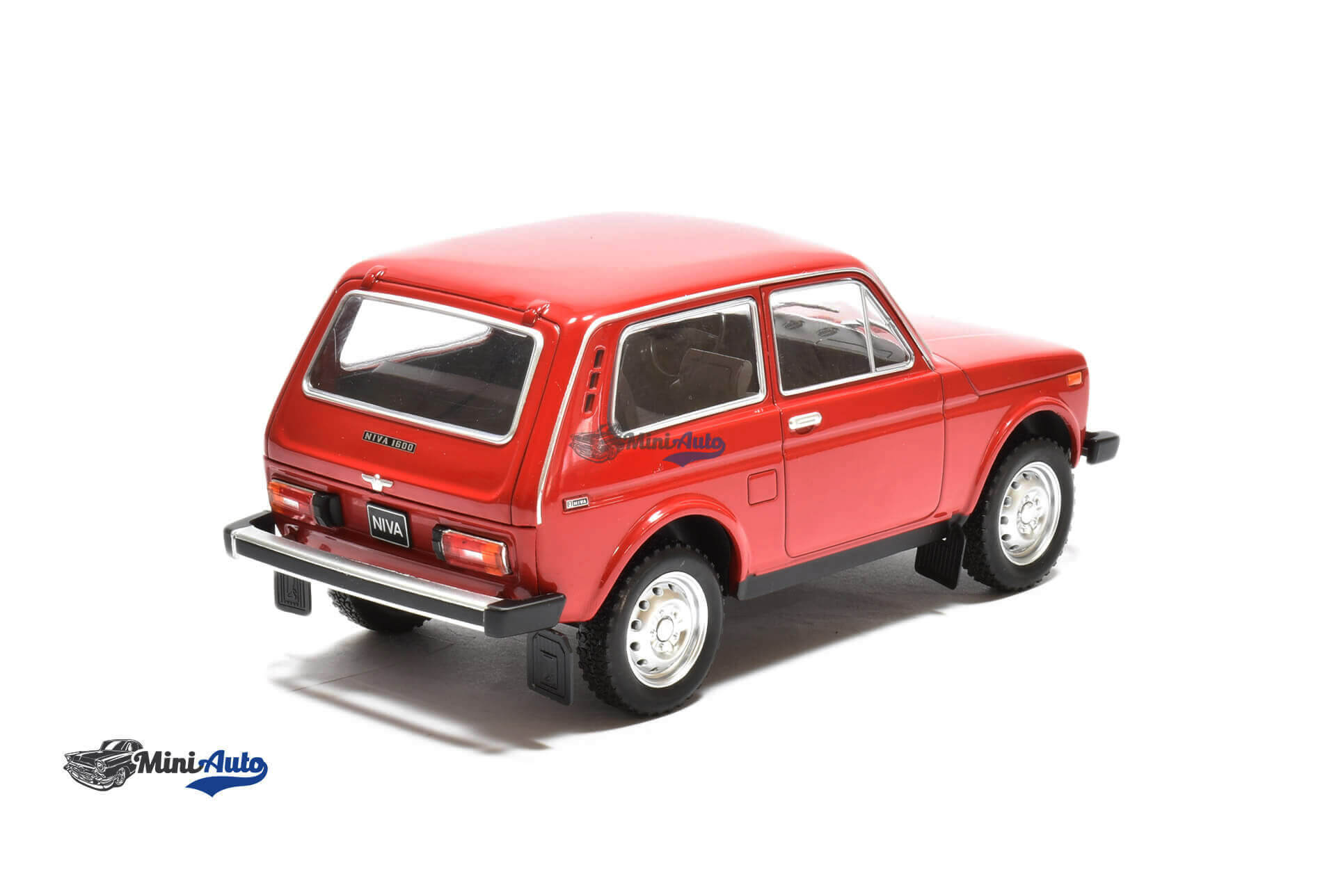 KOVOVÉ a RESIN MODELY | Lada Niva (1976) dark blue - MCG 1:18 | Retro