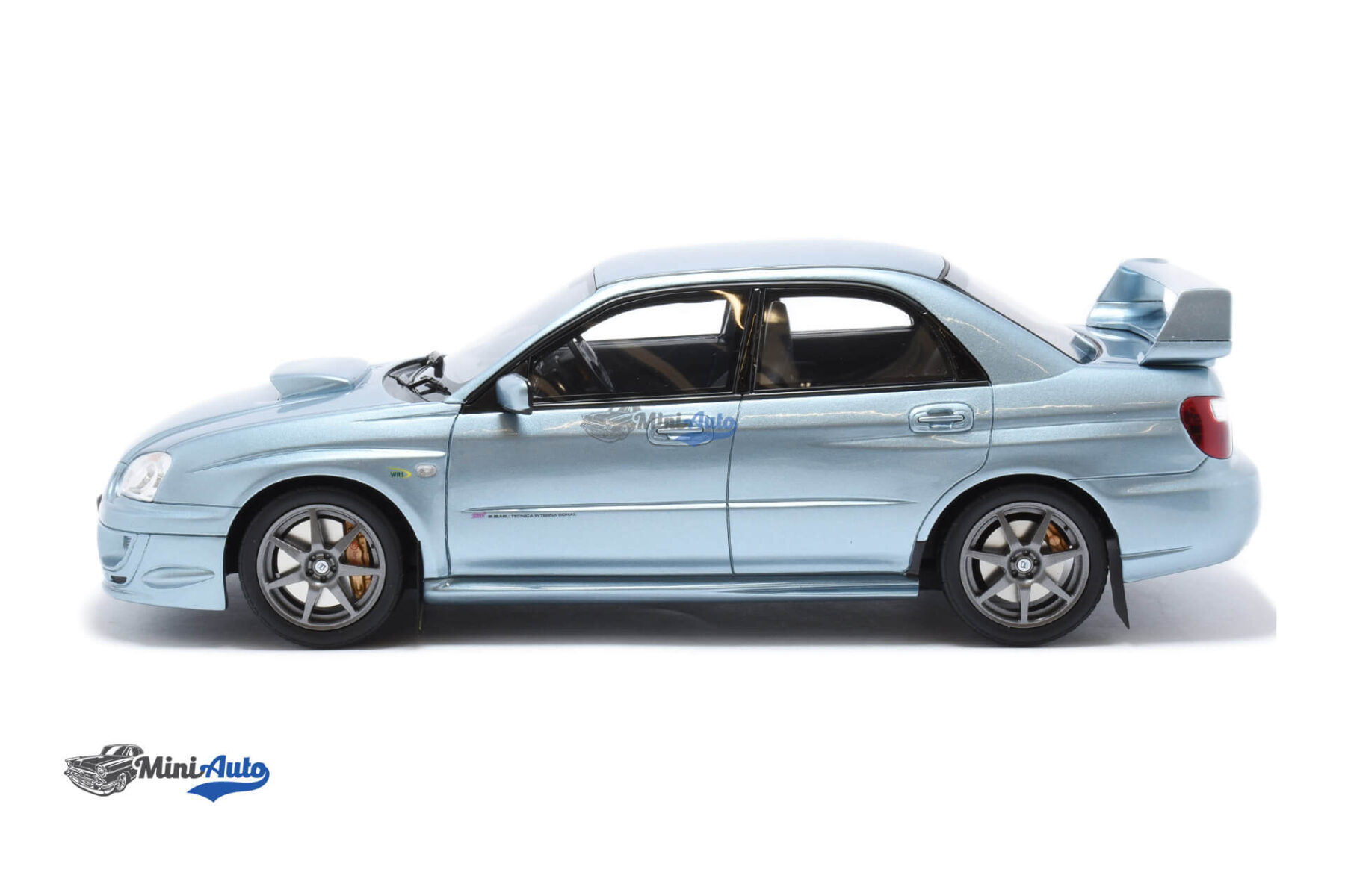 OT1114---Subaru-Impreza-WRX-STi-WR1-P.-Solberg---2003---Light-Blue_3 Subaru Impreza WRX STi WR1 P. Solberg - 2003 - Light Blue - Image 3